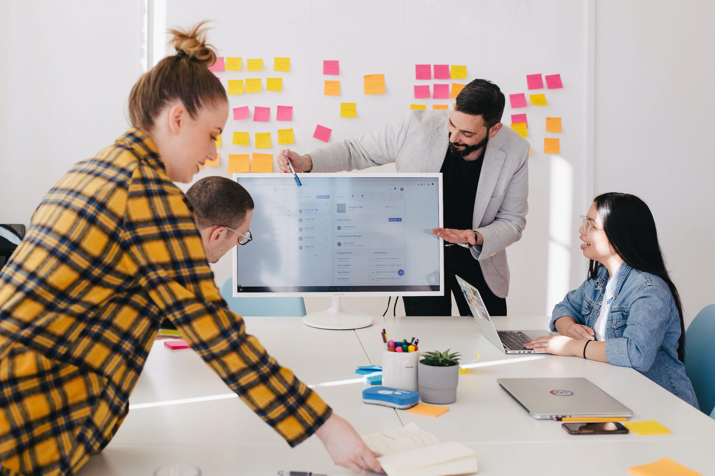 A group of people discussing a project